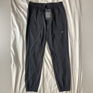 Men’s quick dry, lightweight joggers with pockets. Never worn, with tags.